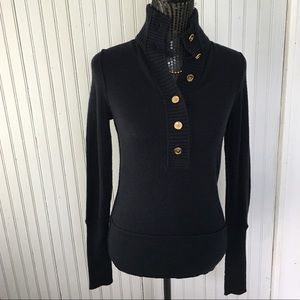 Tory Burch “Carla” turtleneck sweater in navy blue